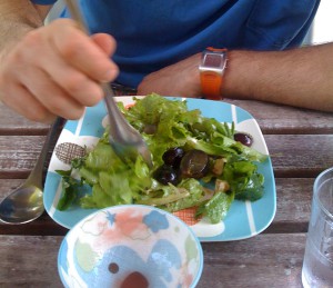 Boy eating salad